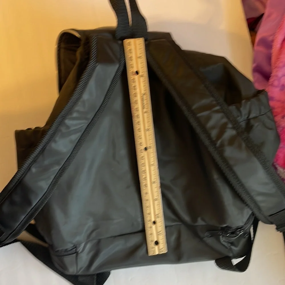 Avon go around town black baby backpack